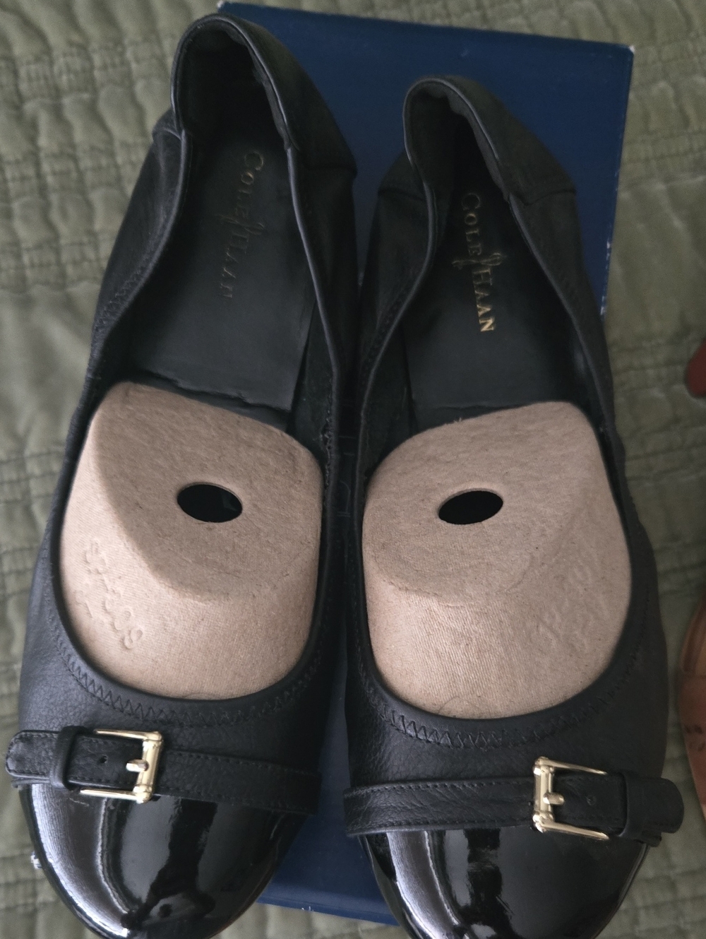Cole Haan Black Leather Ballet Flats with Patent Cap Toe and Gold Buckle